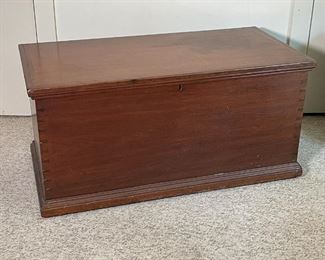 ANTIQUE CHERRY STORAGE CHEST | Lift top with an interior compartment, dovetail construction; appears to be in excellent condition; h. 20-1/2 x w. 42 x d. 21 in. 