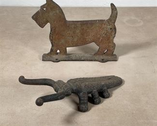 (2pc) CAST IRON DOORSTOP ETC. | Including a dog door stopper (h. 7-1/2 x w. 9-1/2 in.) and a beetle form boot jack (l. 10-1/2 in.) 