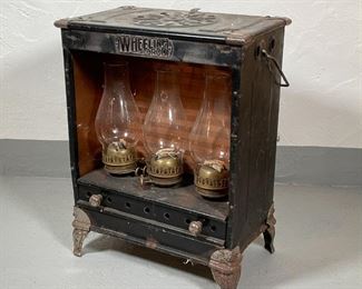 WHEELING CORCO LAMP STOVE | 3 burner oil lamp stove/heater by Wheeling Corrugating Co., Wheeling, W. VA., model no. 315; h. 21 x w. 15-3/4 x d. 10 in. 