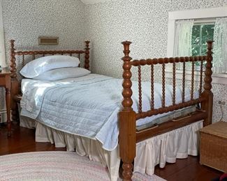 ANTIQUE TURNED WOOD ROPE BED | 19th century, with sausage turnings and a rope sub-structure; h. 41-1/2 x l. 80 x w. 47 in. (mattress 70 x 39 in.) 
