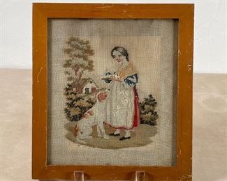 FRAMED PETIT POINT | Needlepoint showing a girl and her dog; subject 7 x 5-1/2 in., overall 10 x 9-1/2 in. frame 