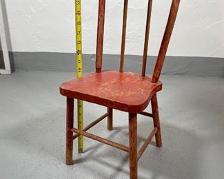 RED-PAINTED CHILD'S CHAIR | With some wear to paint; h. 19 x w. 9 x d. 8-1/2 in. 