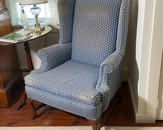 QUEEN ANNE STYLE WING CHAIR | Over cabriole legs with pad feet, having blue upholstery with arrowhead pattern [upholstery with wear in some areas, could be reupholstered]; h. 43 x w. 32 x d. 32 in. 