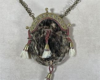 VINTAGE SCOTTISH SPORRAN | Of leather and fur with brass hardware and chain; bag approx. 8 x 6-1/4 in. 