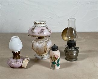 (4pc) FLUID LAMPS & OTHER | Including two painted milk-glass lamps, a painted salt shaker, and a lamp with a hurricane shade and painted reflector; tallest 7 in. 