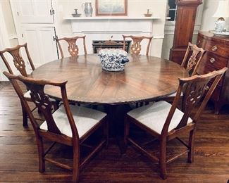 New Classic Custom round 72" dining table.  Walnut with sunburst inlay.  