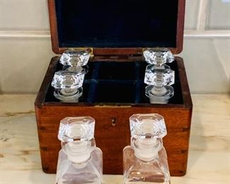 Antique set of six stopper apothecary bottles with mahogany dovetail carrying box