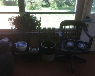 Plant Stand, Horseshoes, Antique Office Chair, Antique Telephones. Crock not for sale. 