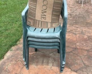4 stacking chairs and welcome mat 