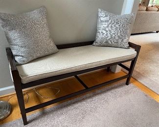 Bench with upholstered cushion