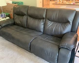 Dark gray leather sofa and love seat.  Recliner with adjustable head rest and USB ports.  