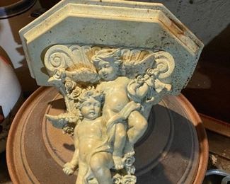 Cupid sconce