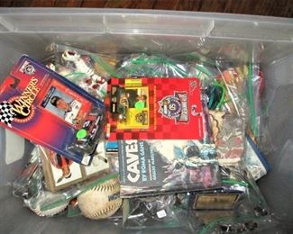 Numerous collectibles in bags.