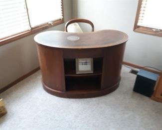 Kidney Shape Desk Antique Circa 1960's  Toronto Ca. Leather Inlay Top 8 Drawers in back Matching Chair                        
20"D X 48"W X 30"T 