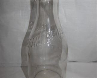 1QT. LEAKE BROS. EMB. MILK BOTTLE 