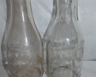 (2) 1QT. LYMAN DAIRY EMB. MILK BOTTLES 