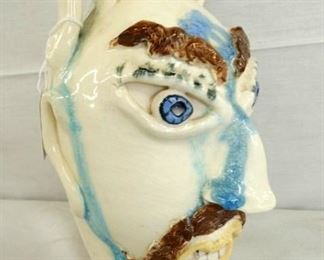 VIEW 2 LEFTSIDE A. TEAGUE FACE JUG 