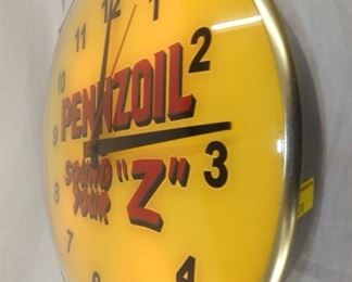 VIEW 4 SIDE VIEW PENNZOIL CLOCK