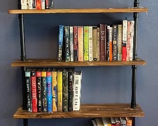 $110, Steampunk style book shelves, attaches to wall via screws. You remove. :)