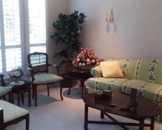 living room set . Sofa and love seat . Piano . corner mahogany cabinet . dolls 
