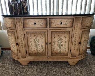 Half round cabinet with black marble top 53"wide x 32"high x 18"deep. 