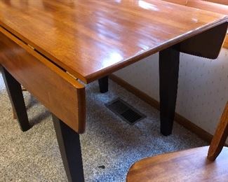 Drop leaf table with 2 chairs. Table measures 42" x 25" with (2) 8-1/2" leafs  