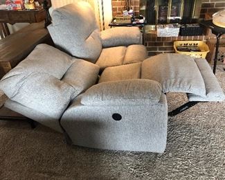 Southern Motion reclining loveseat in gray tones upholstery 69"wide x 34" back height with a seat depth of 23"   