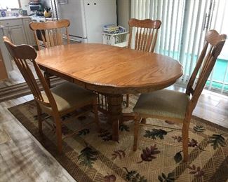 Wood kitchen table and (4) chairs (shown with leaf installed) 