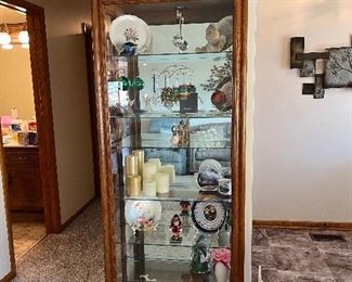 Lighted curio cabinet with sliding door.....