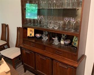 Beautiful glass door mid century modern China hutch. Matching table and chairs