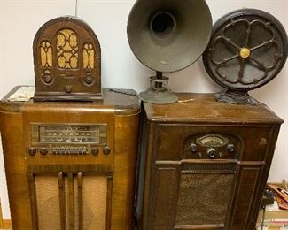 Collection of vintage radios, speakers, and electronics 