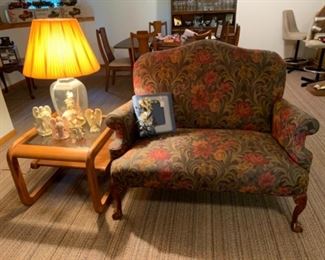 Set of floral loveseats, end tables, table lamp, and angels