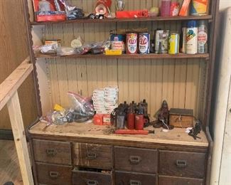 bead board backed antique cabinet with 16 drawers