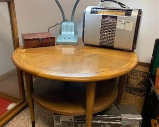 Around mid century modern side table, desk lamp, wood box, and assortment of radios