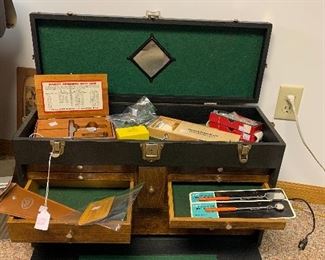 Large wooden toolbox with precision tools