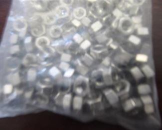 NEW  100 COUNT  1/4" HEX NUT