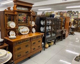 Selection of antique sideboards and china cabinets
