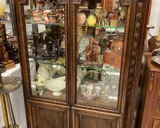 Highly carved curio cabinet

