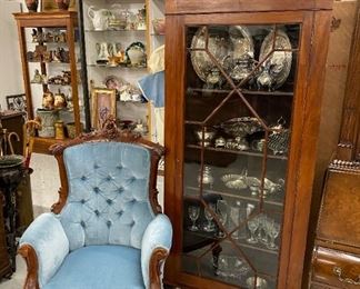 Mahogany corner china cabinet, ornate Victorian armchair