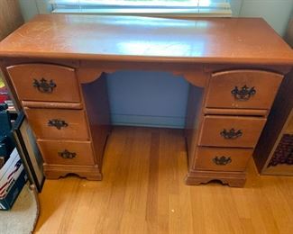 #79	6 drawer Knww-hold Maple Desk (as is finish)  44x17x30	 $50.00 	
