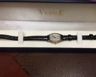 #KH214 Vicence 14K Gold watch w/leather band minimal wear $150 (ask at the checkout desk to see)