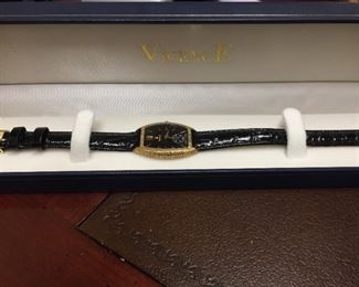 #KH215 Vincence Unisex 14K Italian Gold and leather watch  $175 (ask at the checkout desk to see)