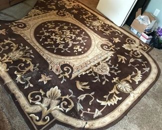 #14	7'3x9'3" Juliette Aubusson brown Chinese rug with birds on the top 	 $100.00 		
