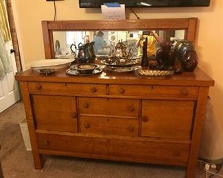 #9	antique oak server with mirror back 5 drawers and 2 doors 	 $1,200.00 		
