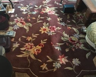 #62	brown round Chinese rug with red roses 70inches	 $75.00 		
