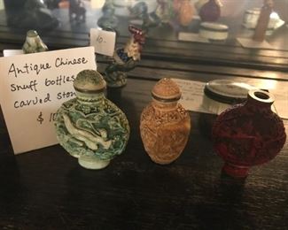 #122	Antique Chinese Snuff Bottles Carved Stone  (set of 3)	 $100.00 		
