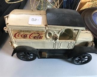 #206	misc	cocola cast iron truck bank 	 $50.00 		

