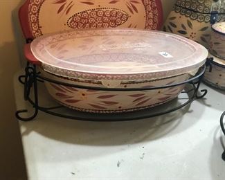 #145	Kitchen	Temptation casserole pot with lid and metal carrier 13x8.5x4	 $30.00 		
