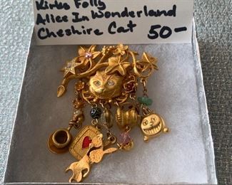 #  214  Kirks Folly Alice in wonderland Chesir cat pin $50