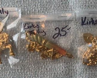 #213       Kirks folly pin carasel house $25                                    
# 215 Kirks Folly pin with charms $25                                                     
# Kirks folly charm bracelet  $25
